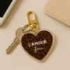 Porte-clés l'amour fou graou marron/noir